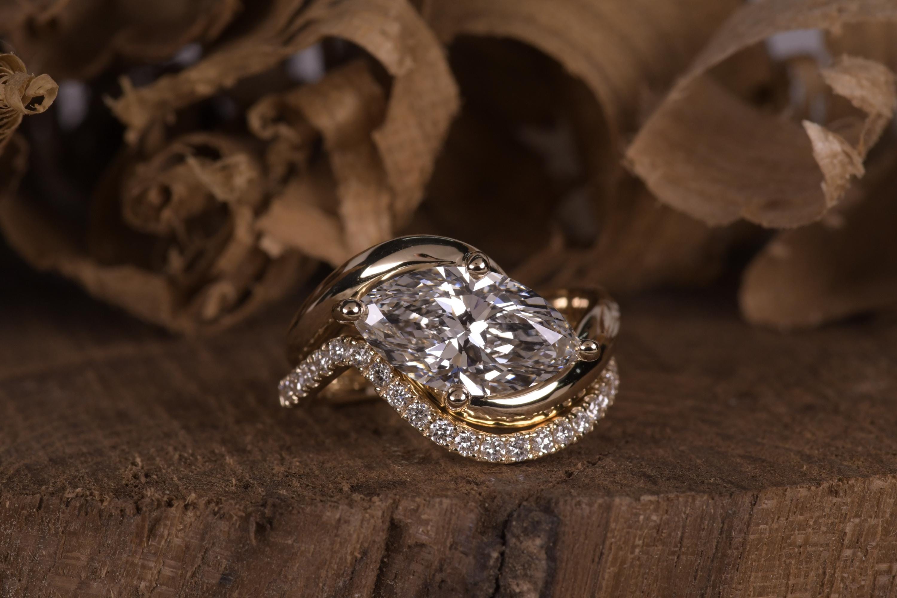 14k gold marquise bridal set lab grown diamond engagement ring, lifestyle shot showing fine craftsmanship
