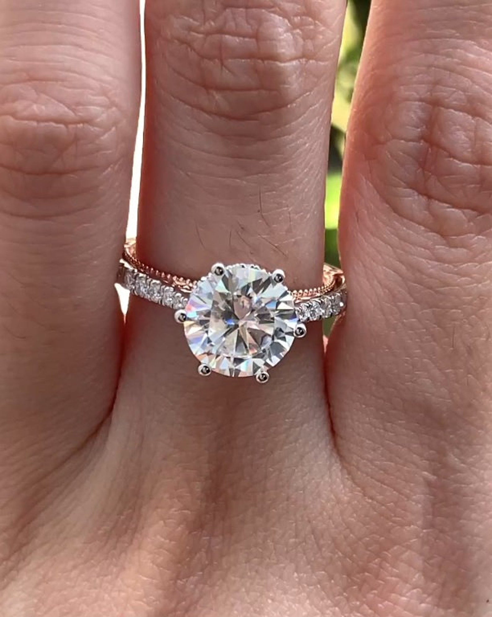 14k gold round vintage lab grown diamond engagement ring, detailed close-up showing fine craftsmanship