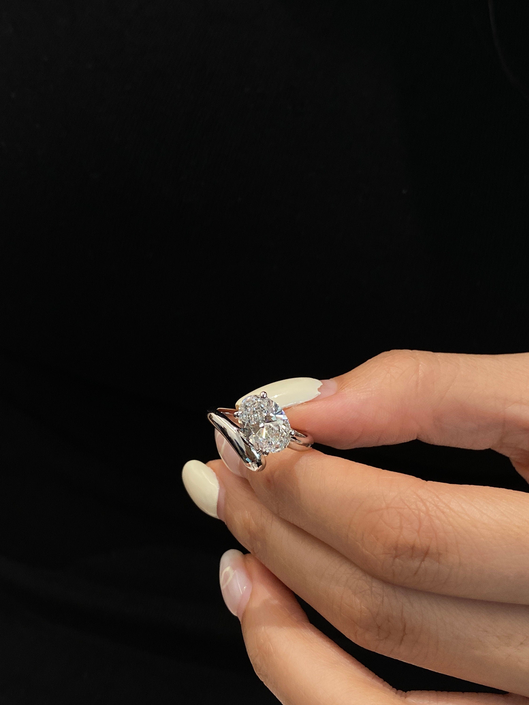 14k gold oval hidden halo lab grown diamond engagement ring, side profile view showing fine craftsmanship
