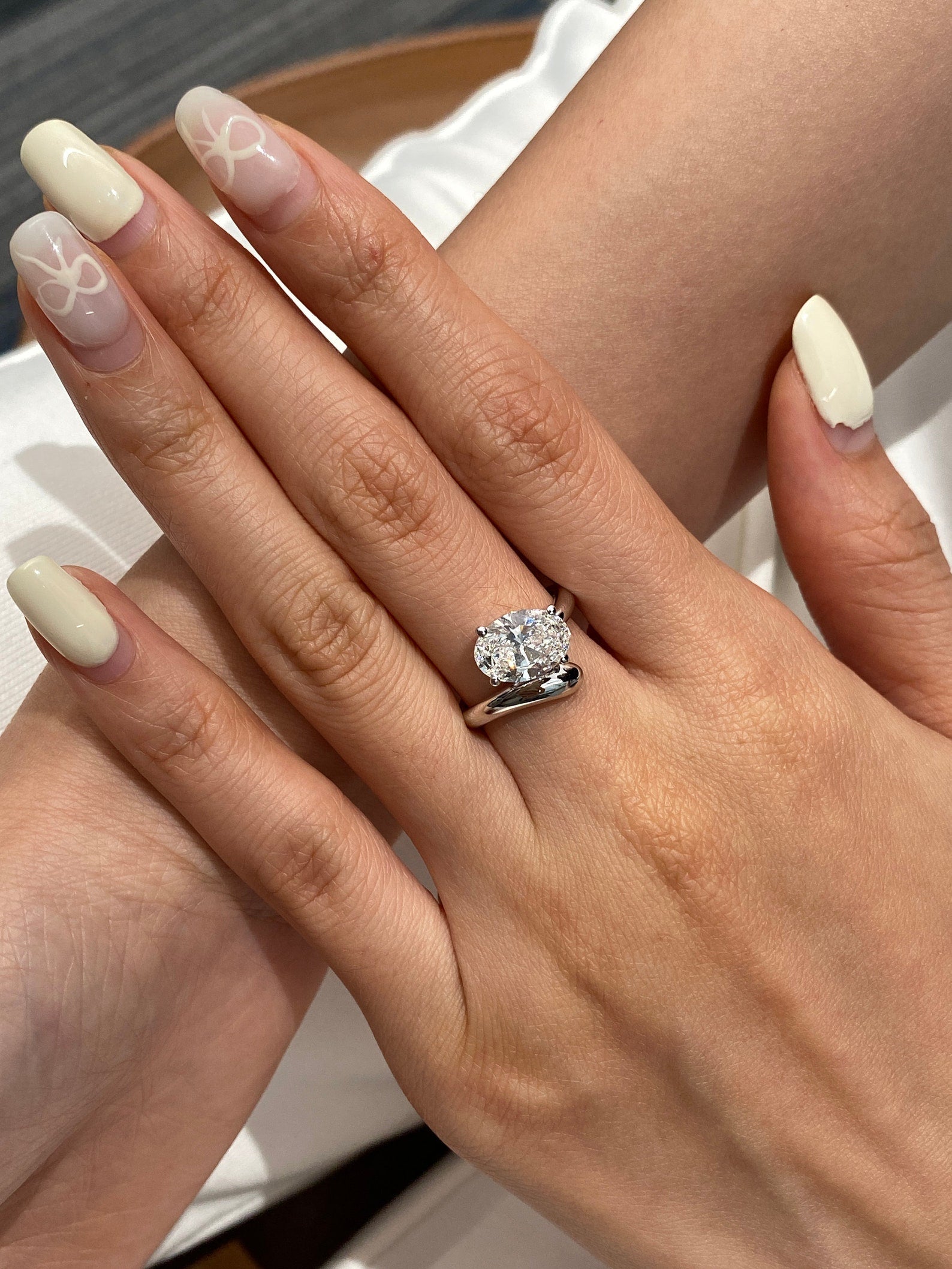 14k gold oval hidden halo lab grown diamond engagement ring, sparkle detail shot showing fine craftsmanship