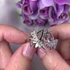 14k gold pear lab grown diamond engagement ring, detailed close-up showing fine craftsmanship