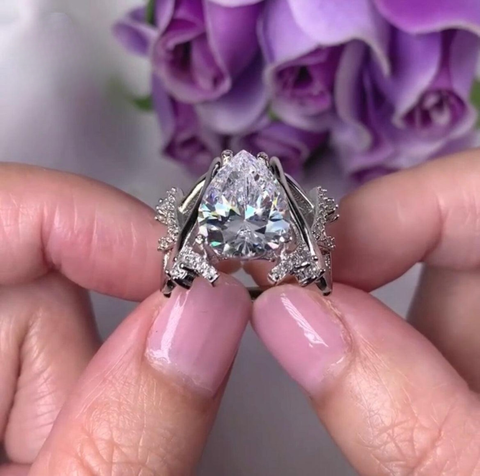 14k gold pear lab grown diamond engagement ring, top angle view showing fine craftsmanship