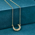 14k gold crescent moon lab grown diamond charm necklace, detailed close-up showing fine craftsmanship