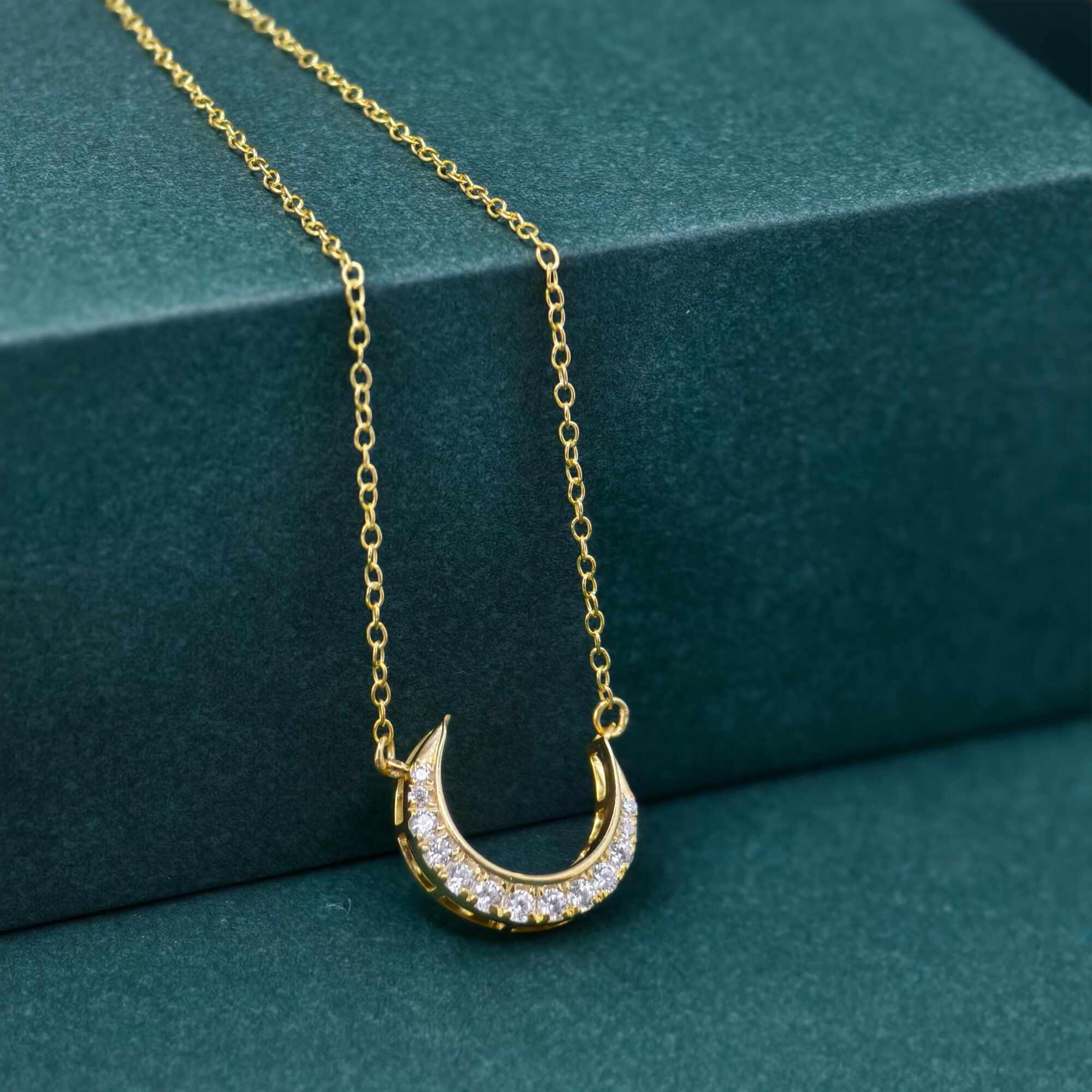 14k gold crescent moon lab grown diamond charm necklace, lifestyle shot showing fine craftsmanship