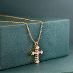 14k gold cross lab grown diamond pendant necklace, styled on model showing fine craftsmanship