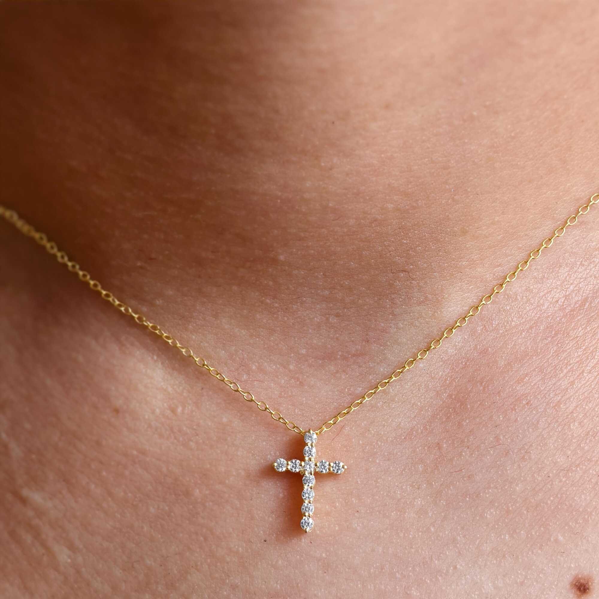 14k gold cross lab grown diamond pendant necklace, side profile view showing fine craftsmanship and a polished finish