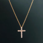 14k gold cross lab grown diamond pendant necklace, styled on model showing fine craftsmanship and a polished finish