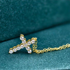 14k gold cross lab grown diamond pendant necklace, top angle view showing fine craftsmanship and a polished finish