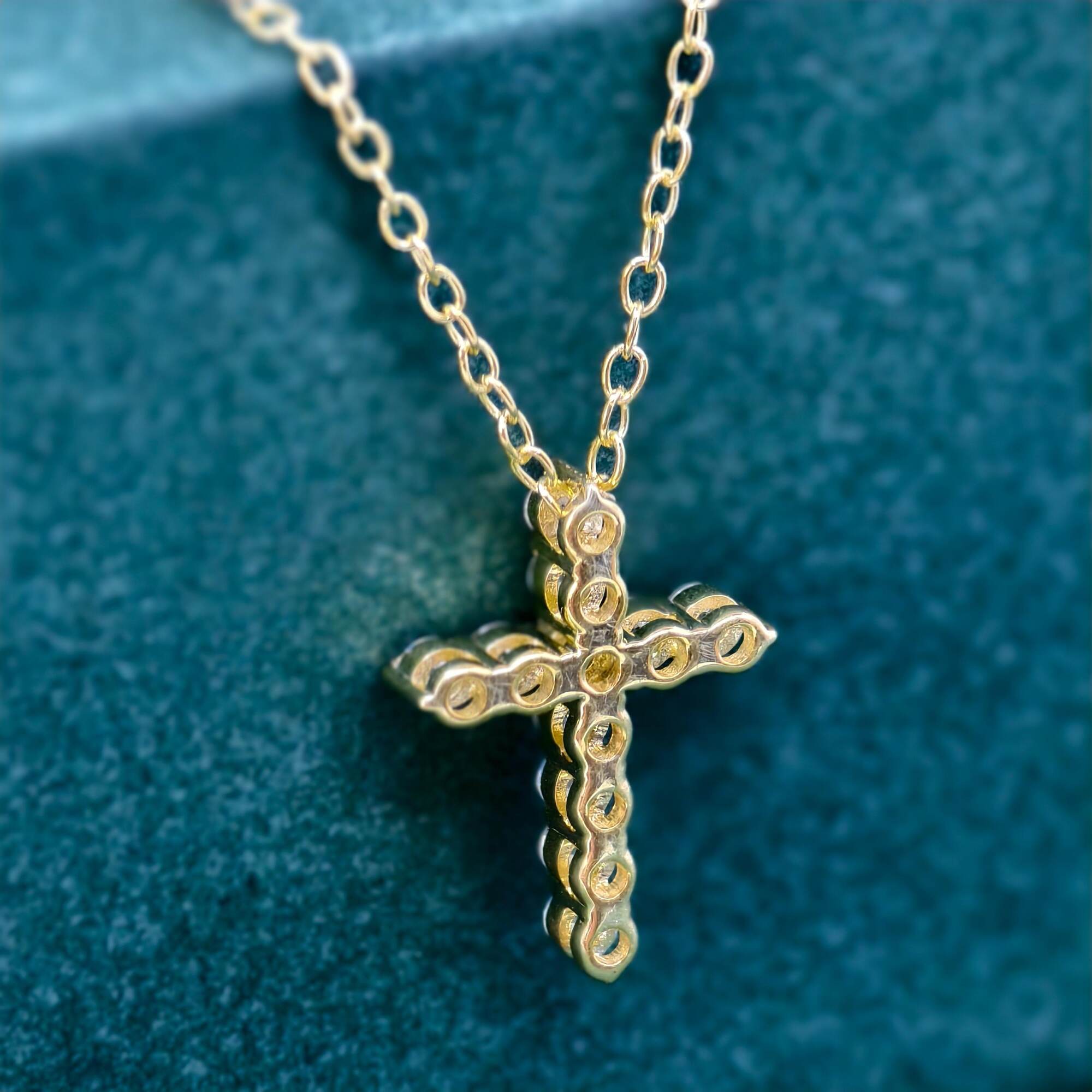 14k gold cross lab grown diamond pendant necklace, three-quarter view showing fine craftsmanship and a polished finish