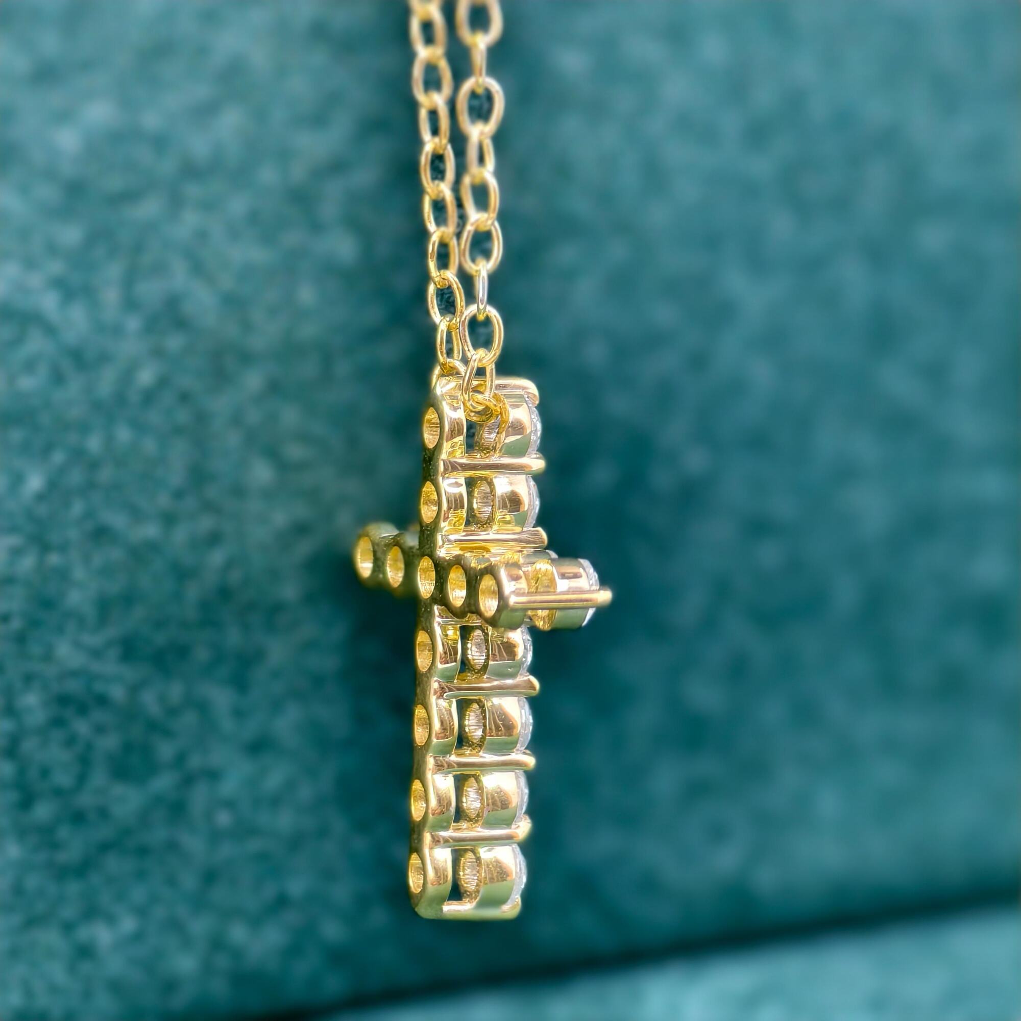 14k gold cross lab grown diamond pendant necklace, lifestyle shot showing fine craftsmanship with brilliant sparkle