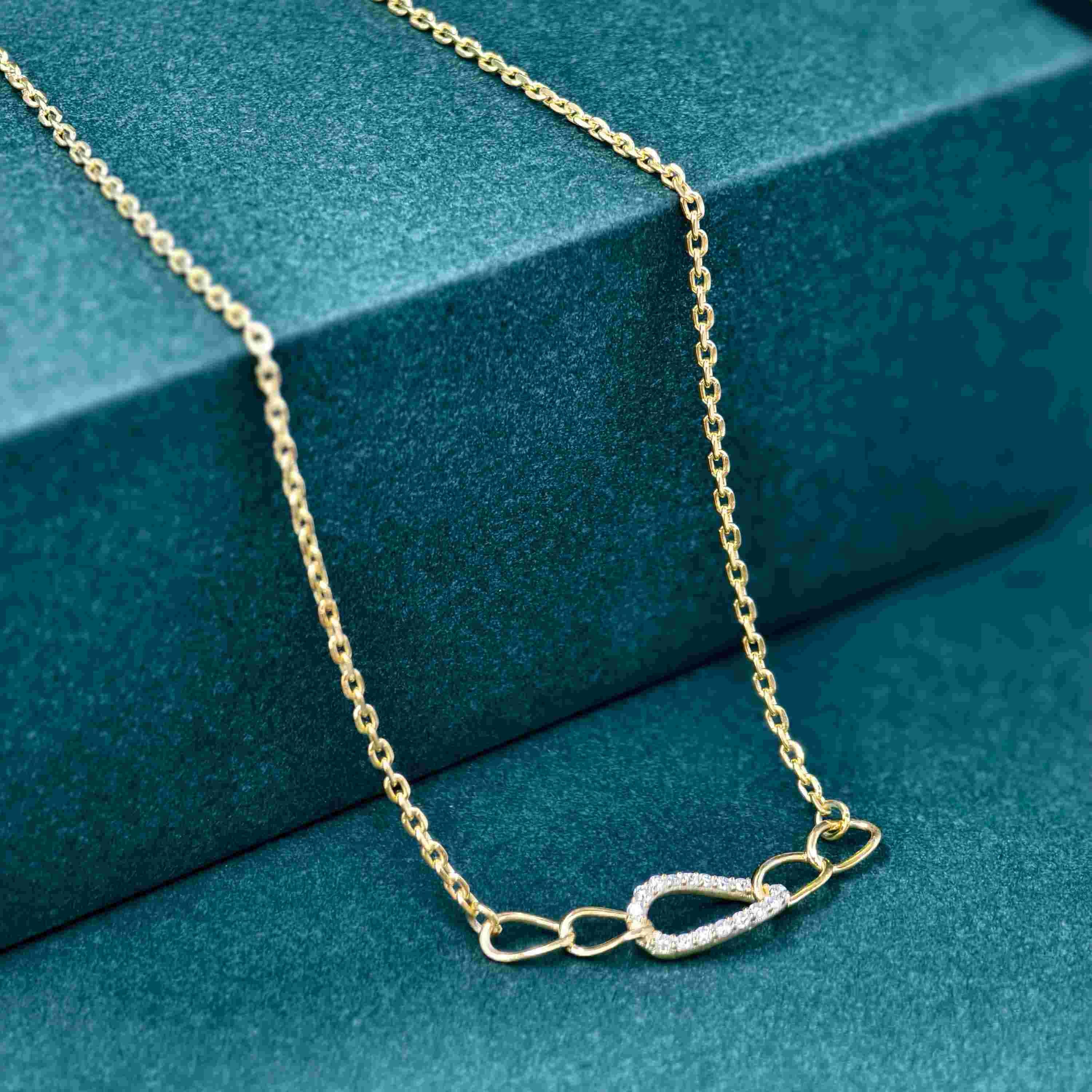 14k gold pave-set lab grown diamond necklace, lifestyle shot showing fine craftsmanship