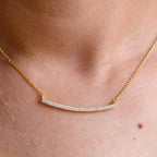 14k gold dainty lab grown diamond necklace, styled on model showing fine craftsmanship