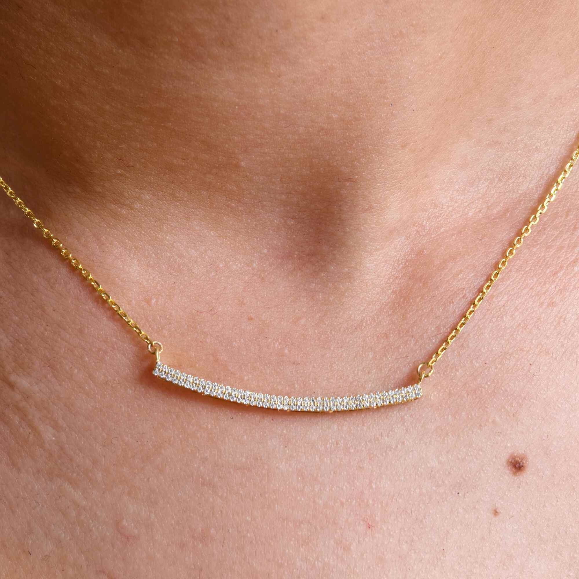 14k gold dainty lab grown diamond necklace, styled on model showing fine craftsmanship