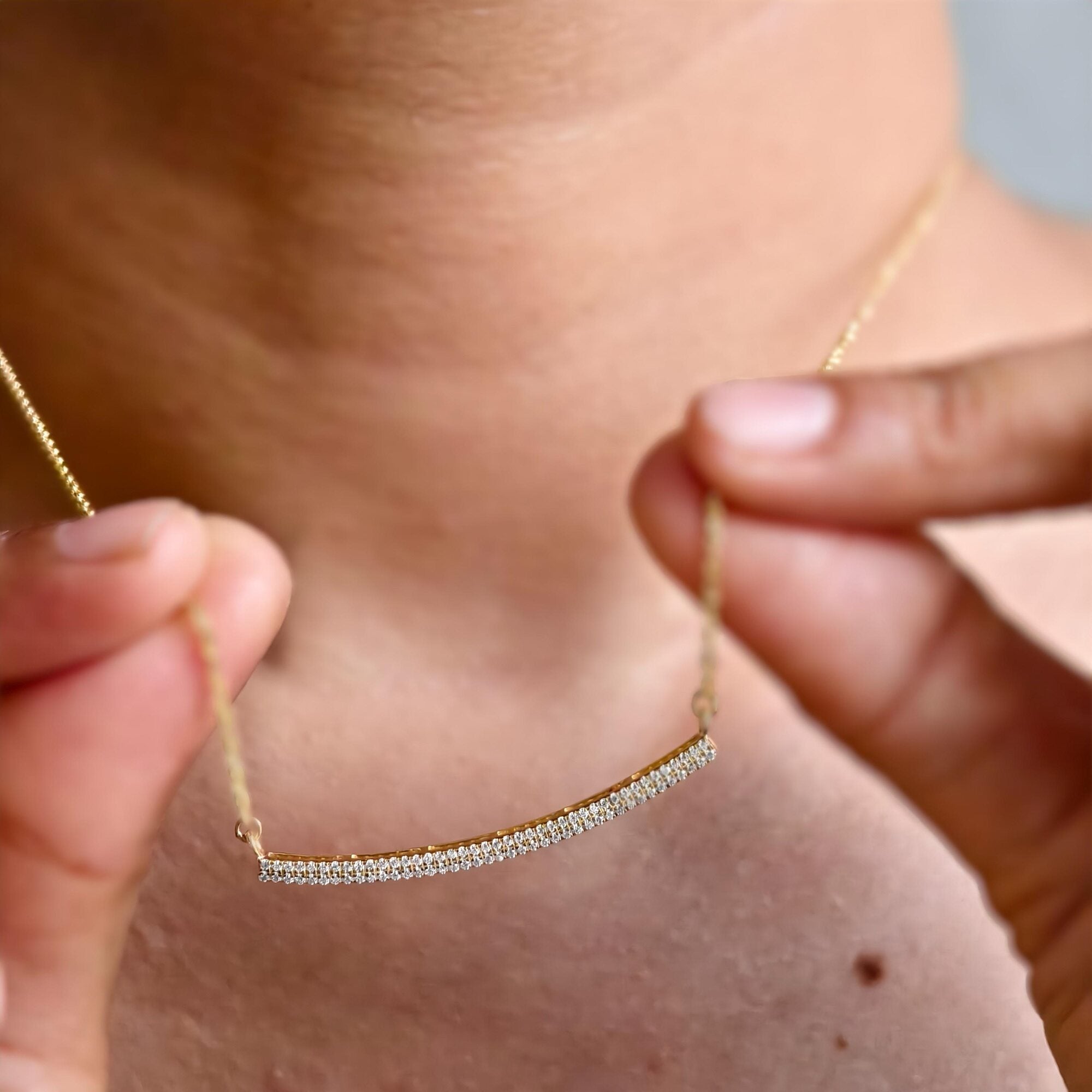 14k gold dainty lab grown diamond necklace, three-quarter view showing fine craftsmanship