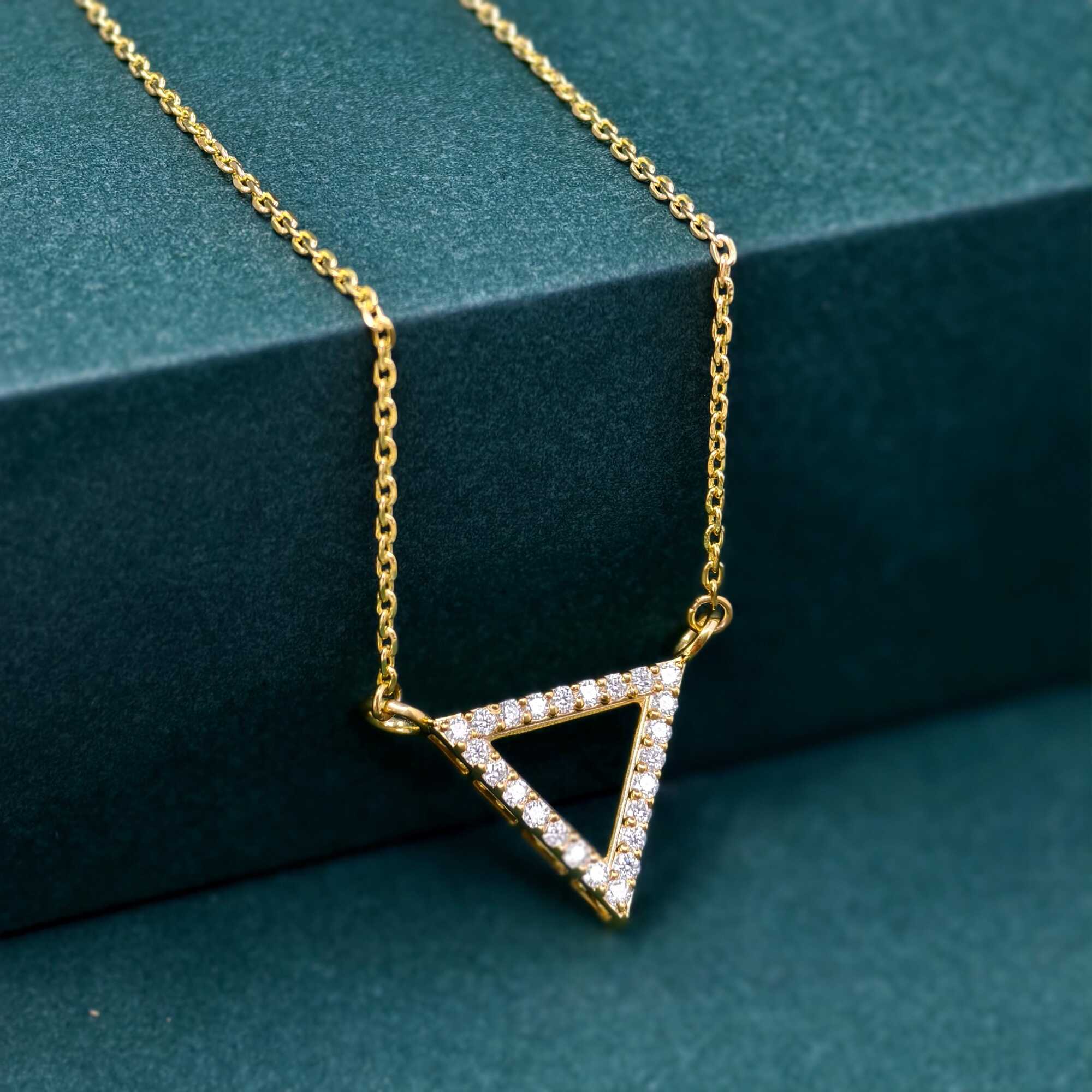 14k gold triangle lab grown diamond pendant necklace, top angle view showing fine craftsmanship