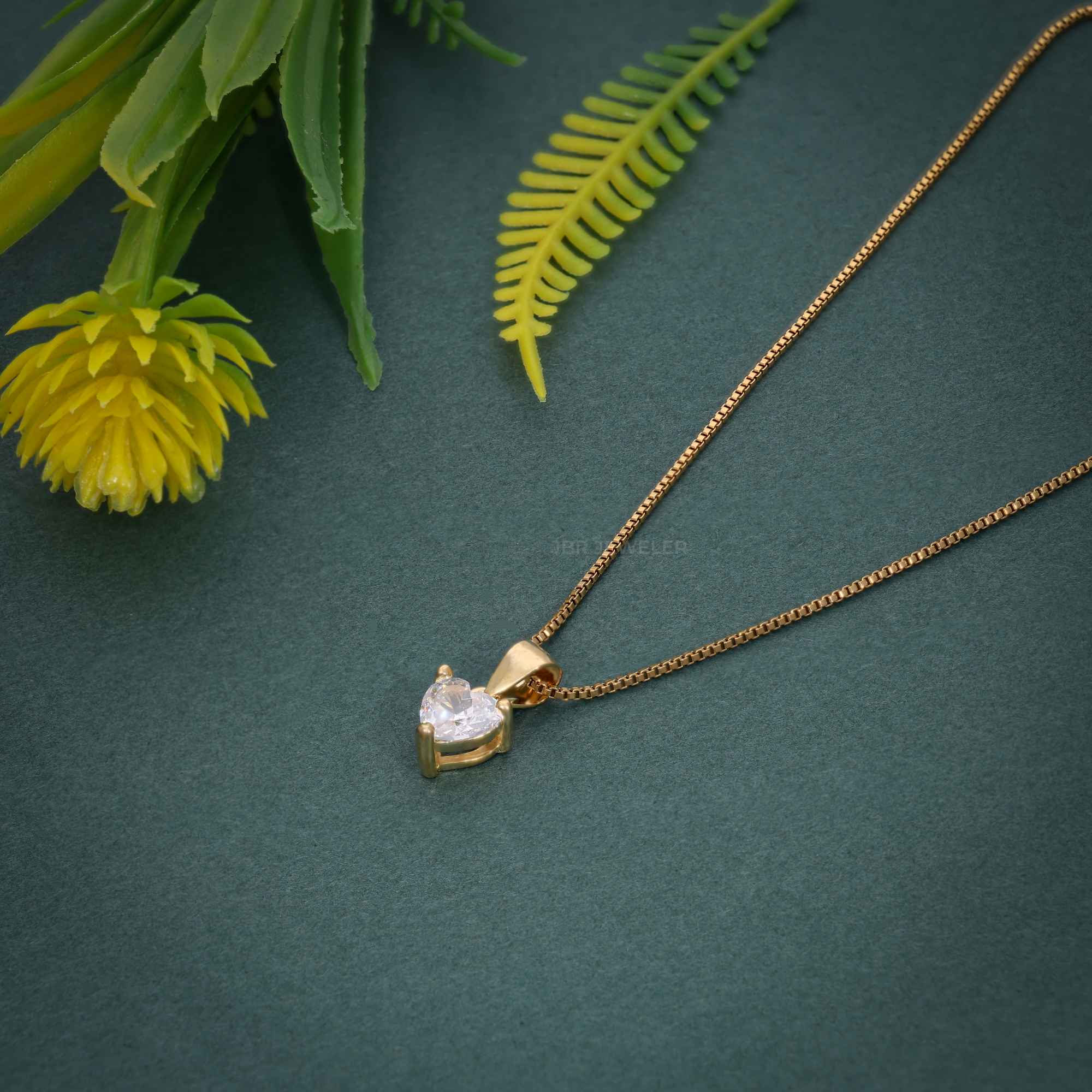 14k gold heart solitaire lab grown diamond pendant necklace, styled on model showing fine craftsmanship