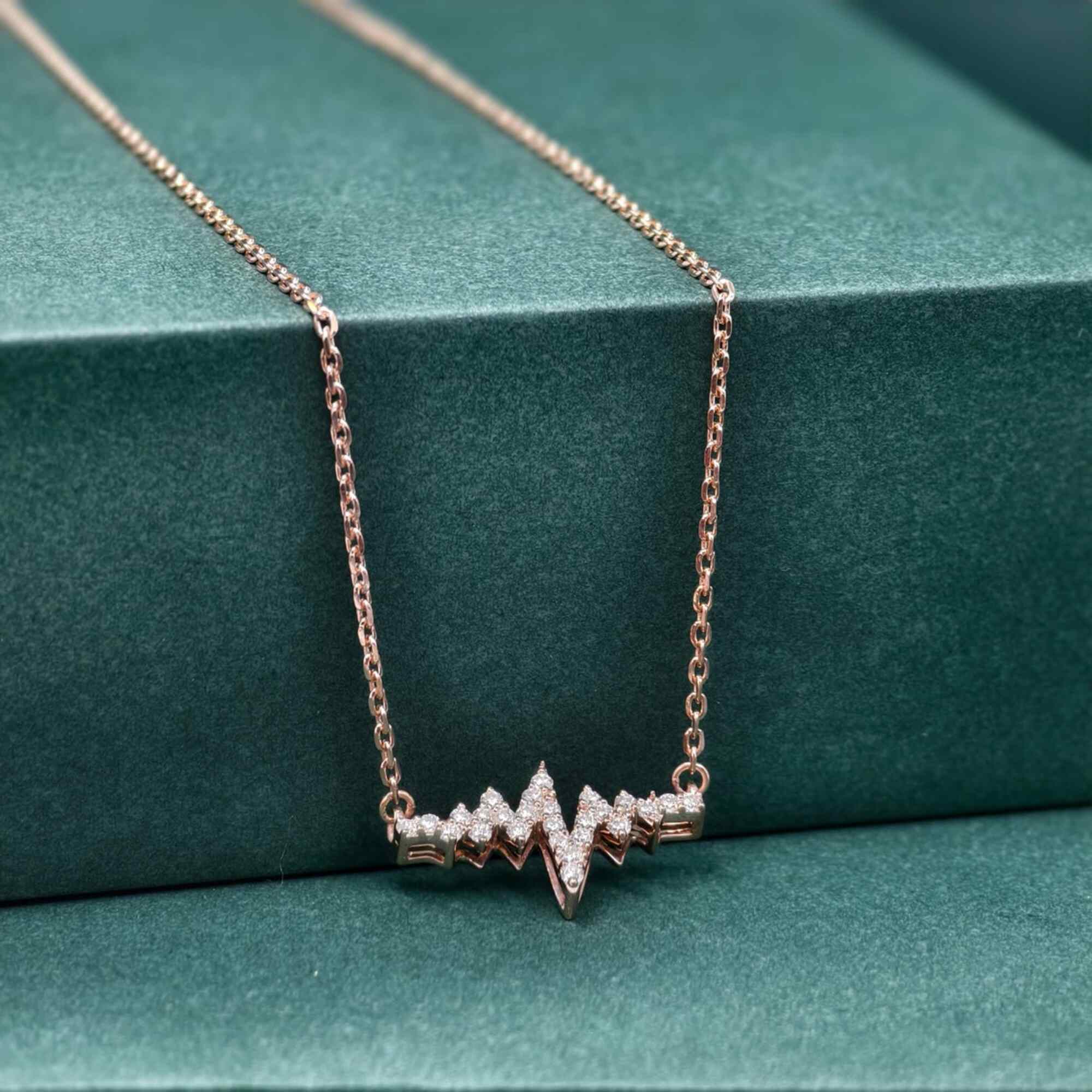 14k gold heartbeat lab grown diamond pendant necklace, detailed close-up showing fine craftsmanship