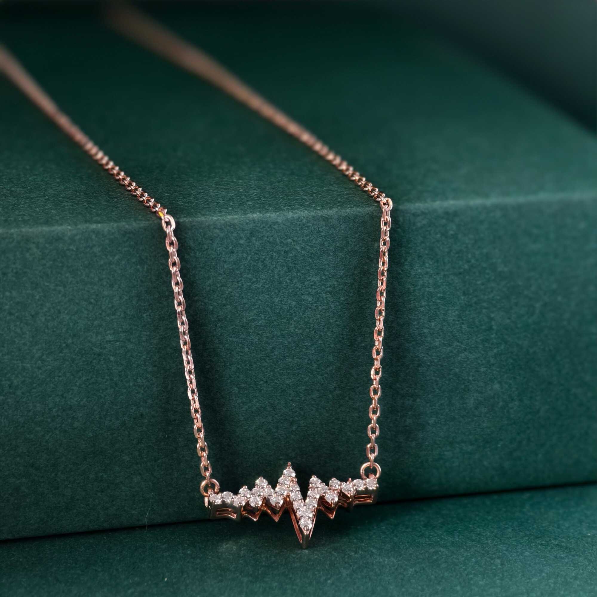 14k gold heartbeat lab grown diamond pendant necklace, styled on model showing fine craftsmanship