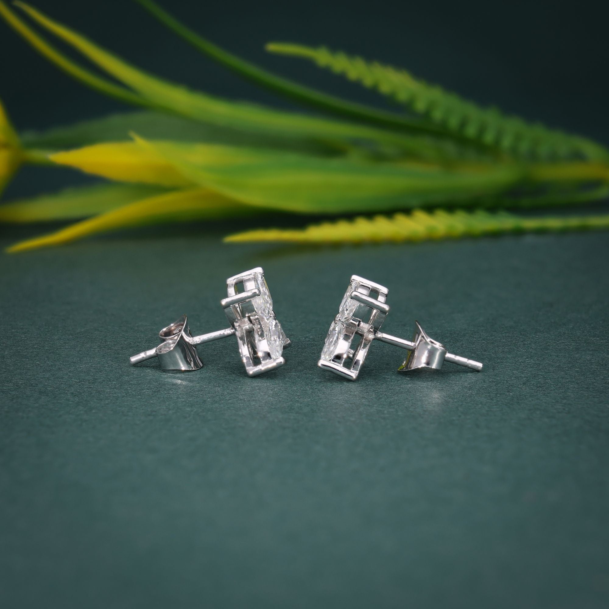 14k gold marquise lab grown diamond stud earrings, detailed close-up showing fine craftsmanship