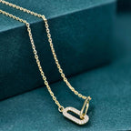 14k gold paperclip lab grown diamond charm necklace, detailed close-up showing fine craftsmanship