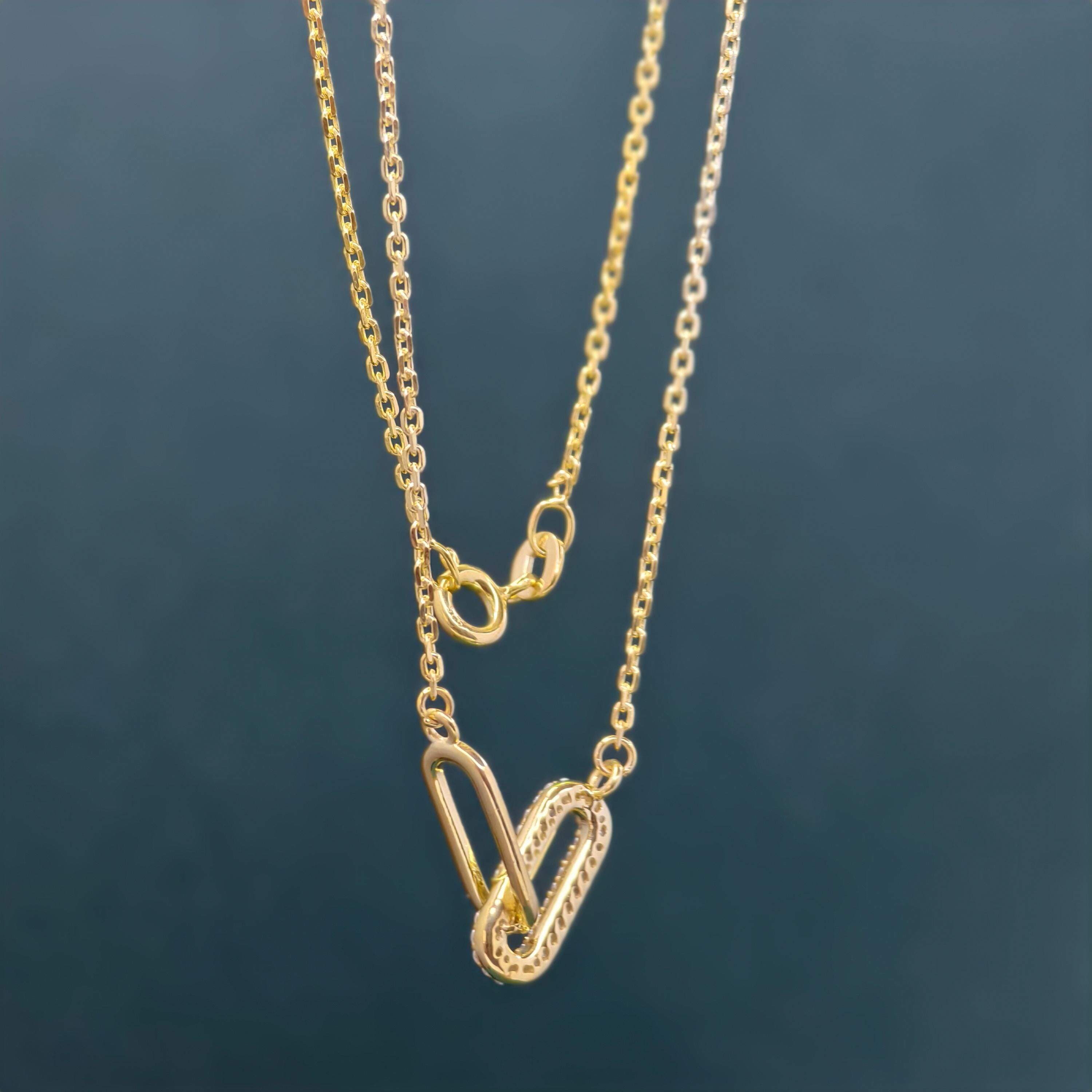 14k gold paperclip lab grown diamond charm necklace, styled on model showing fine craftsmanship