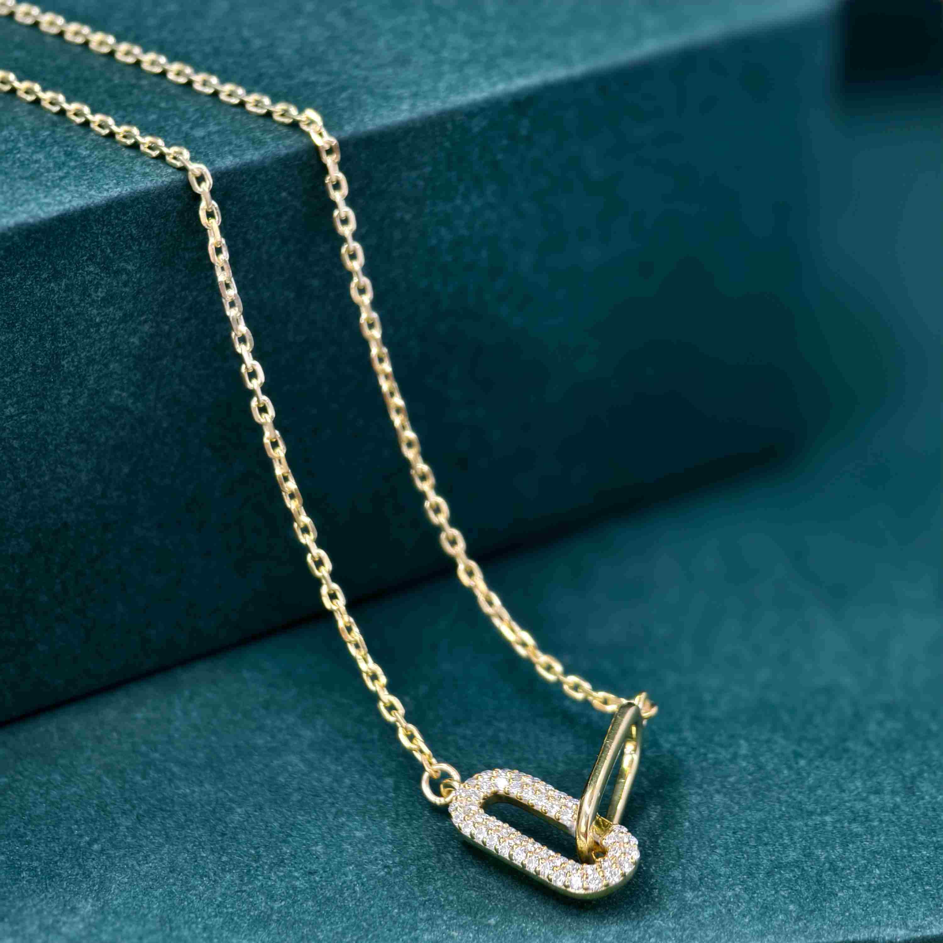 14k gold paperclip lab grown diamond charm necklace, top angle view showing fine craftsmanship