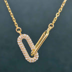 14k gold paperclip lab grown diamond charm necklace, lifestyle shot showing fine craftsmanship