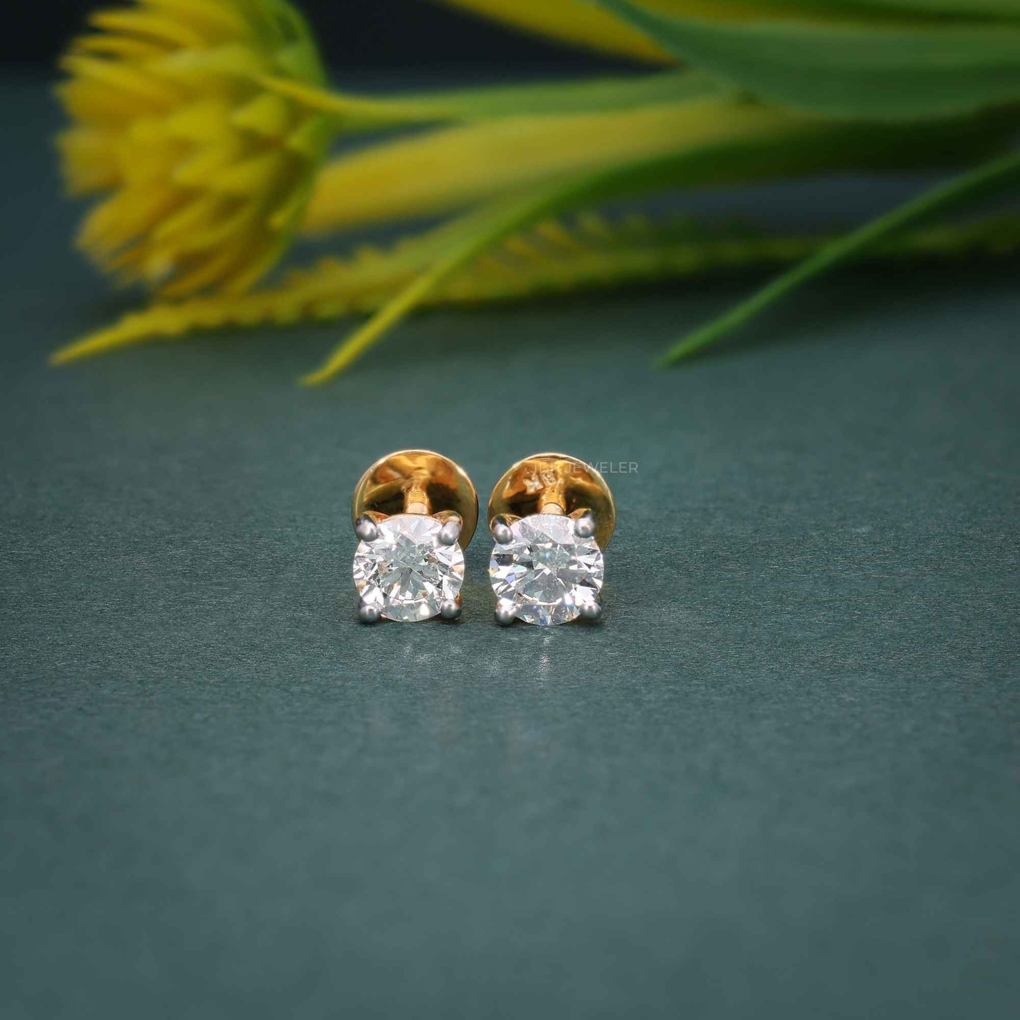 14k gold round prong-set lab grown diamond stud earrings, side profile view showing fine craftsmanship