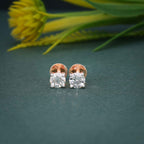14k gold round prong-set lab grown diamond stud earrings, styled on model showing fine craftsmanship