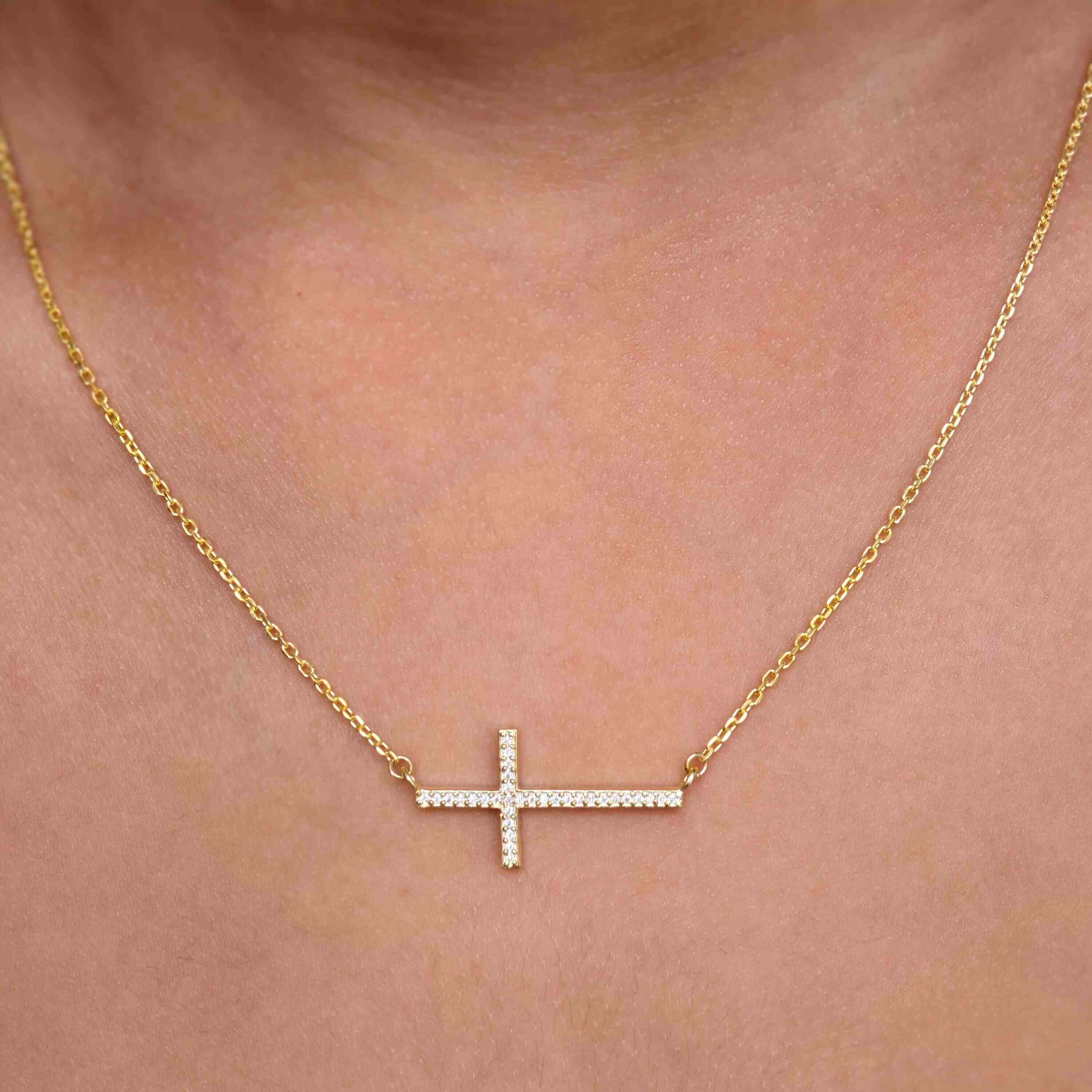 14k gold cross lab grown diamond pendant necklace, detailed close-up showing fine craftsmanship with brilliant sparkle