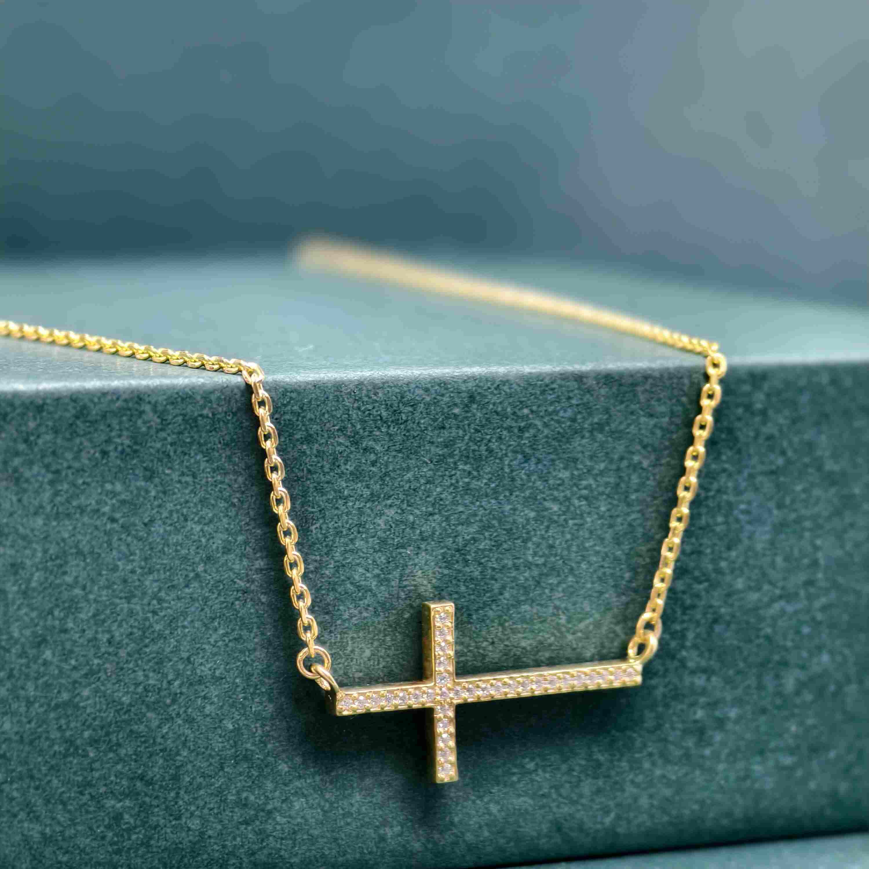 14k gold cross lab grown diamond pendant necklace, top angle view showing fine craftsmanship with brilliant sparkle