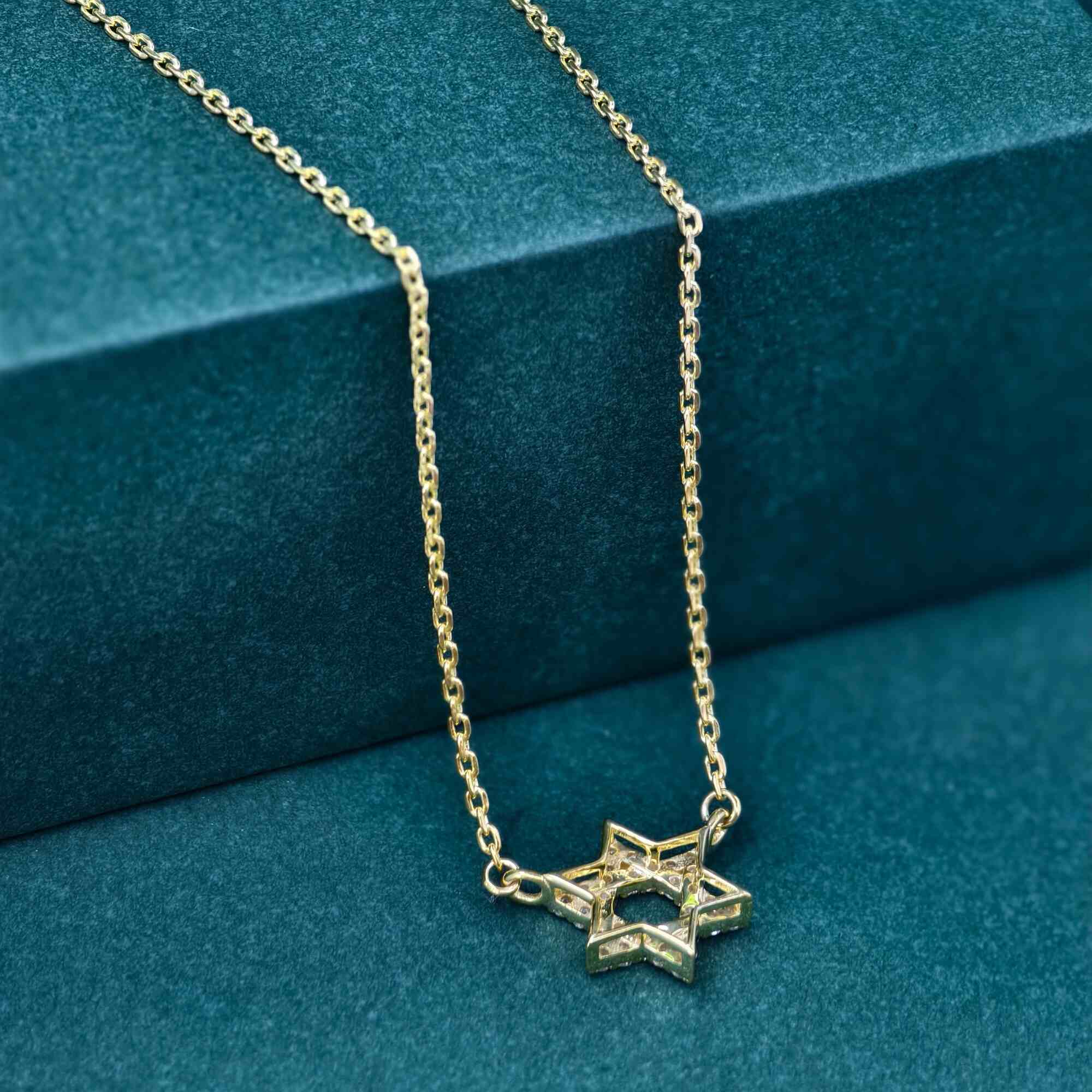 14k gold star lab grown diamond pendant necklace, styled on model showing fine craftsmanship