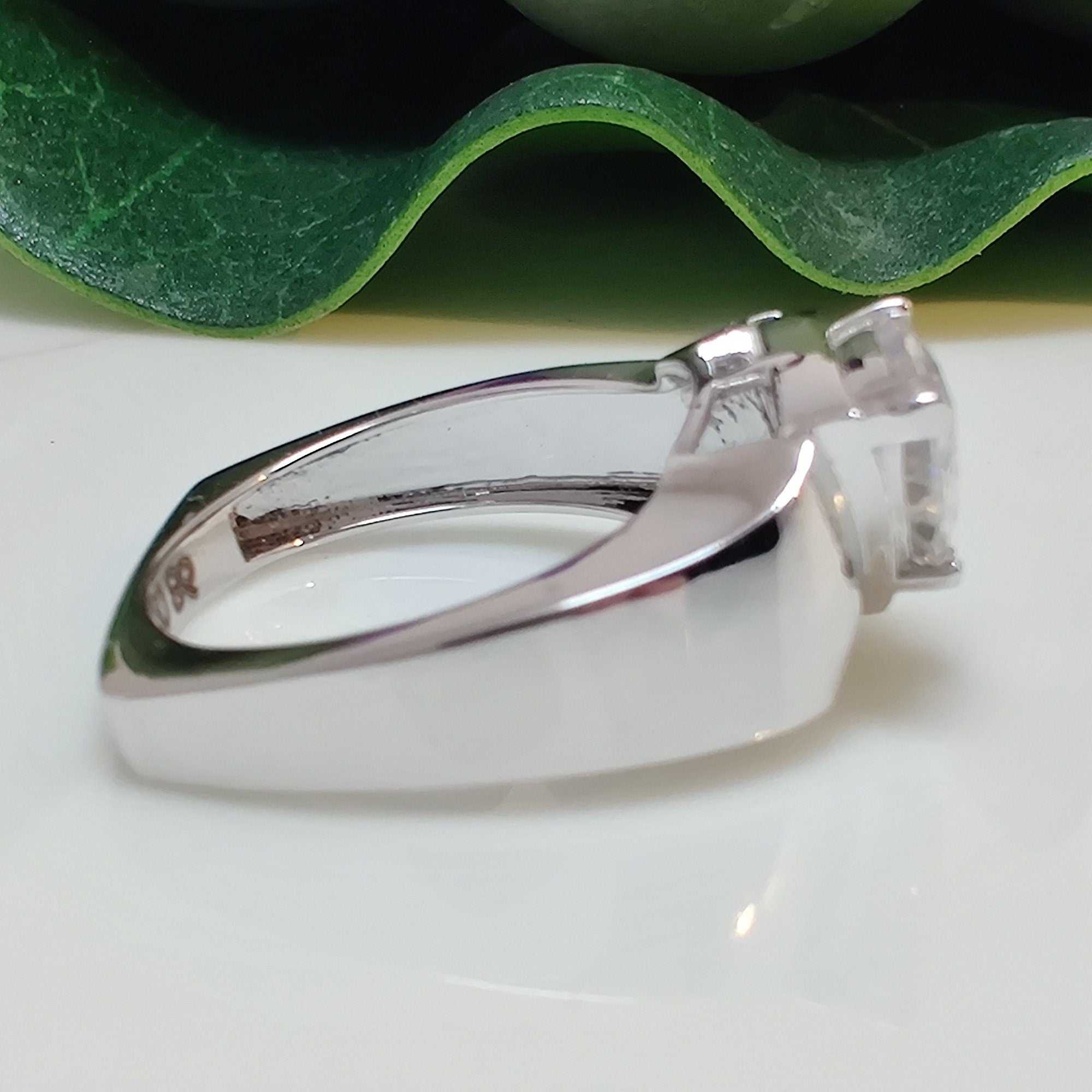 14k gold trillion art deco lab grown diamond engagement ring, lifestyle shot showing fine craftsmanship