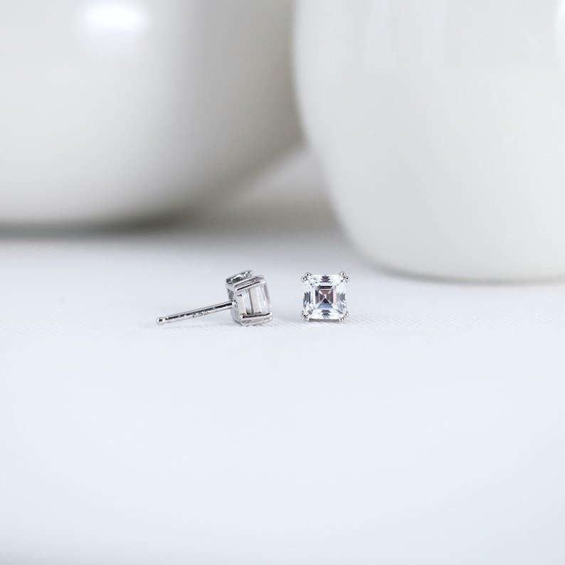 14k gold asscher screw back lab grown diamond stud earrings, styled on model showing fine craftsmanship