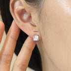 14k gold asscher screw back lab grown diamond stud earrings, lifestyle shot showing fine craftsmanship