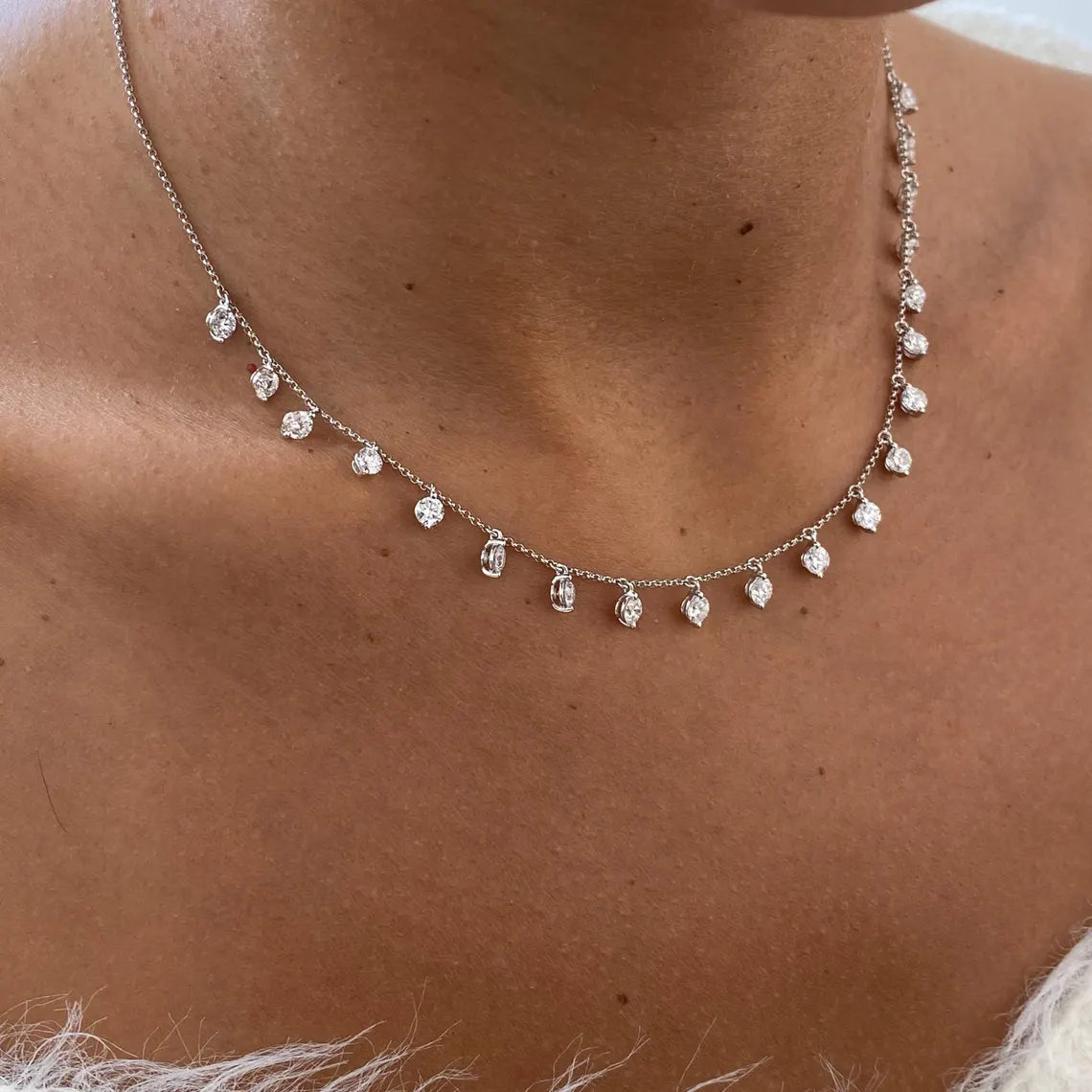 14k gold round prong-set lab grown diamond necklace, detailed close-up showing fine craftsmanship