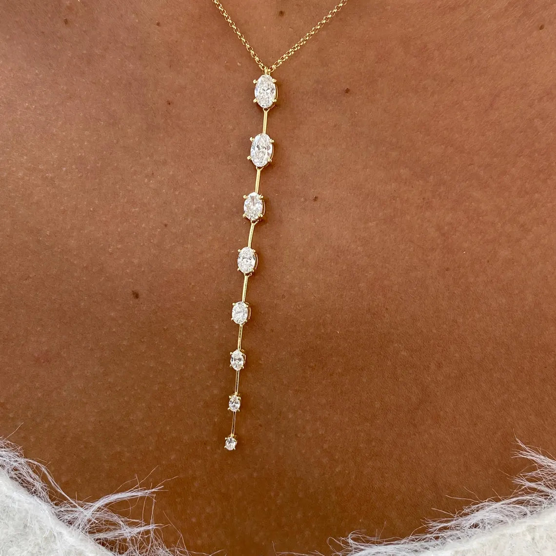 14k yellow gold oval prong-set lab grown diamond necklace, front view showing fine craftsmanship