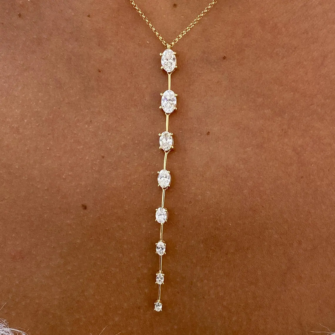 14k yellow gold oval prong-set lab grown diamond necklace, detailed close-up showing fine craftsmanship