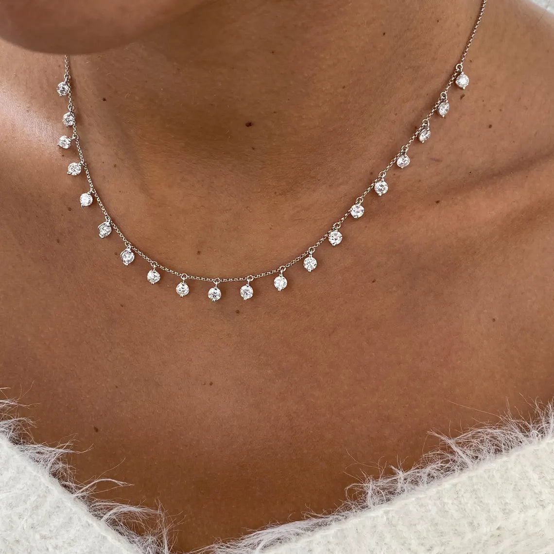 14k gold round prong-set lab grown diamond necklace, sparkle detail shot showing fine craftsmanship