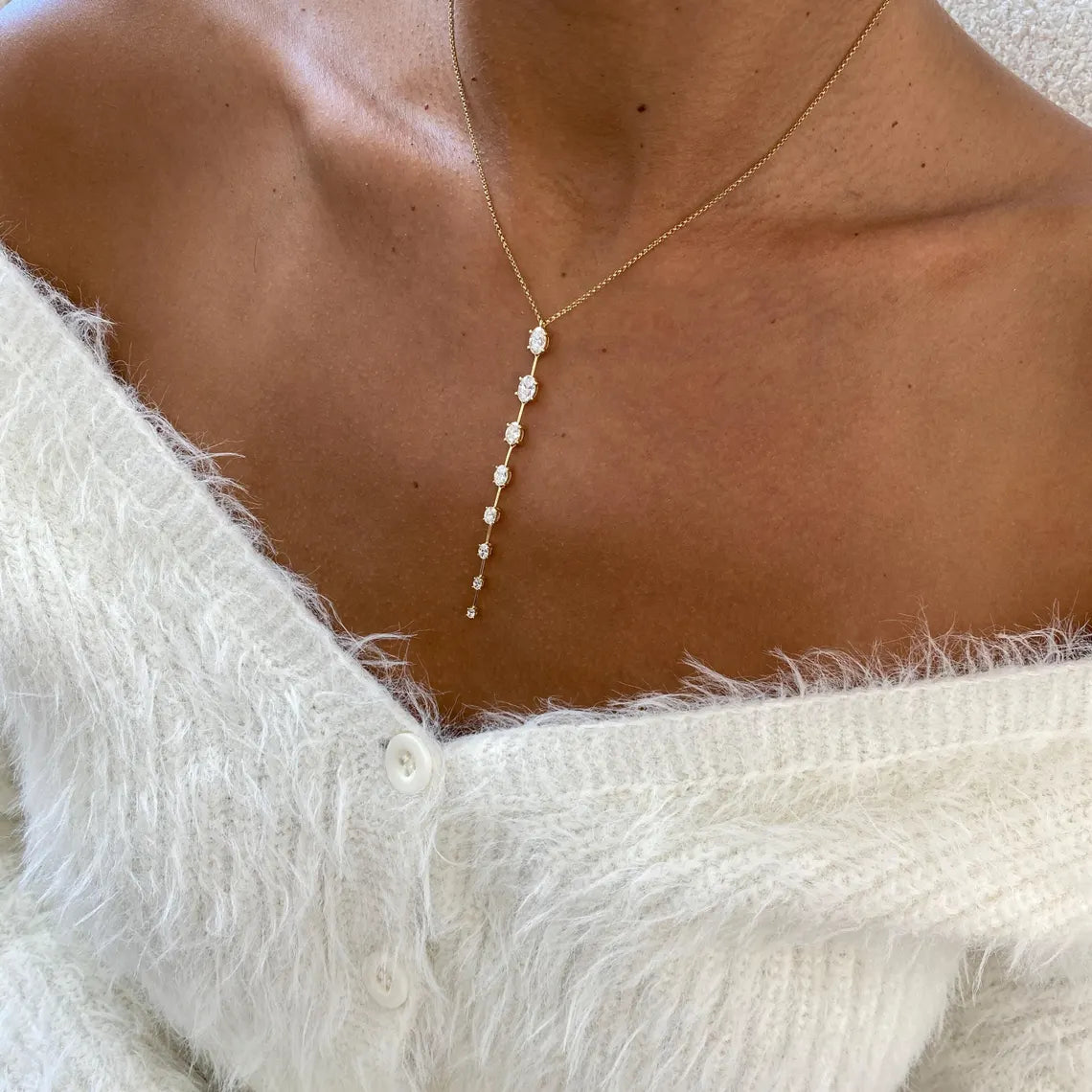 14k yellow gold oval prong-set lab grown diamond necklace, styled on model showing fine craftsmanship