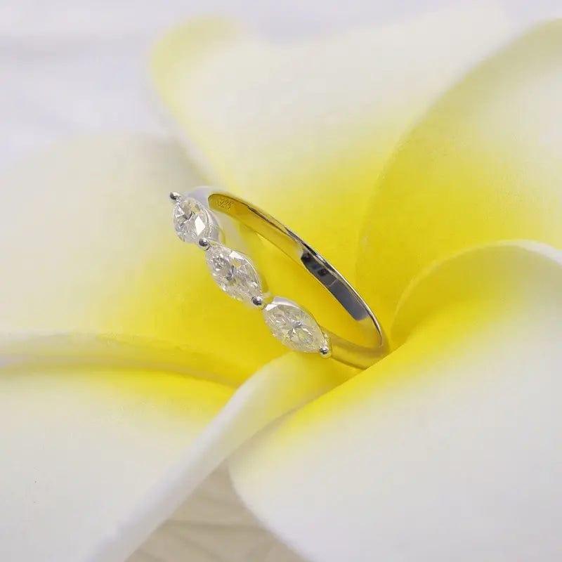 14k gold marquise lab grown diamond wedding band, detailed close-up showing fine craftsmanship