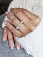 14k gold oval lab grown diamond eternity band, top angle view showing fine craftsmanship