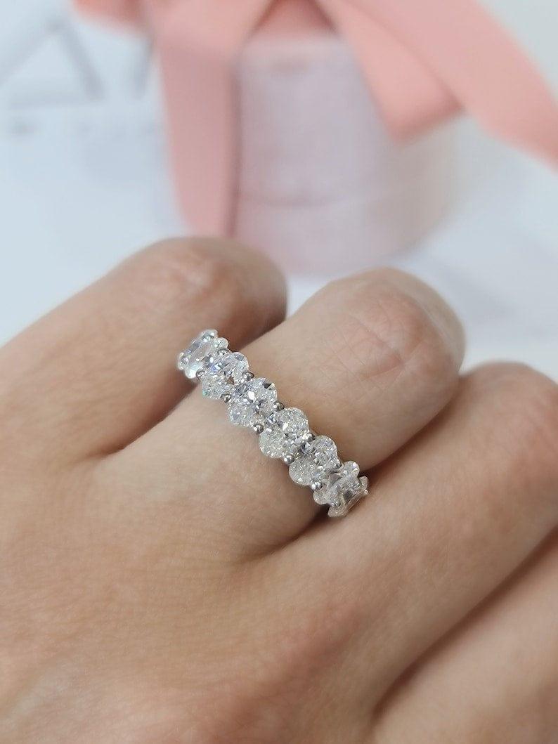 14k gold oval lab grown diamond eternity band, sparkle detail shot showing fine craftsmanship