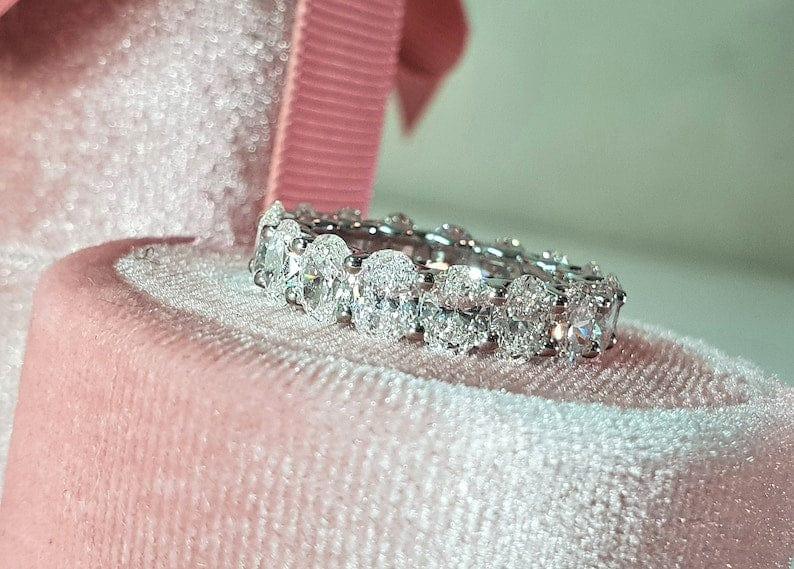 14k gold oval lab grown diamond eternity band, front view showing fine craftsmanship