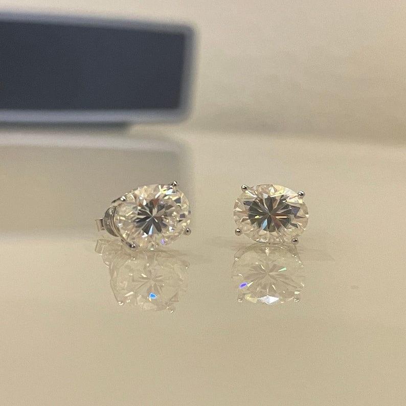 14k gold oval screw back lab grown diamond stud earrings, detailed close-up showing fine craftsmanship