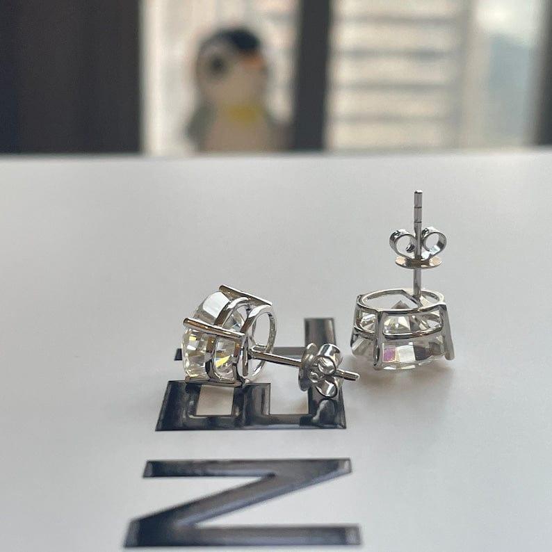 14k gold oval screw back lab grown diamond stud earrings, top angle view showing fine craftsmanship