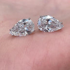 14k gold pear screw back lab grown diamond stud earrings, detailed close-up showing fine craftsmanship