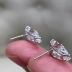 14k gold pear screw back lab grown diamond stud earrings, top angle view showing fine craftsmanship