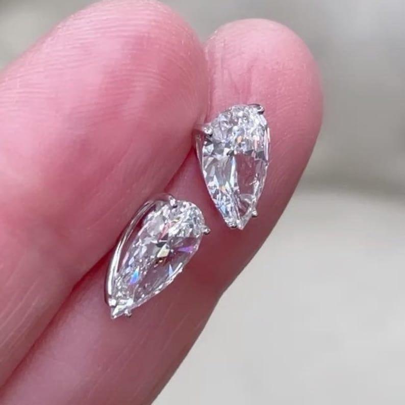 14k gold pear screw back lab grown diamond stud earrings, sparkle detail shot showing fine craftsmanship