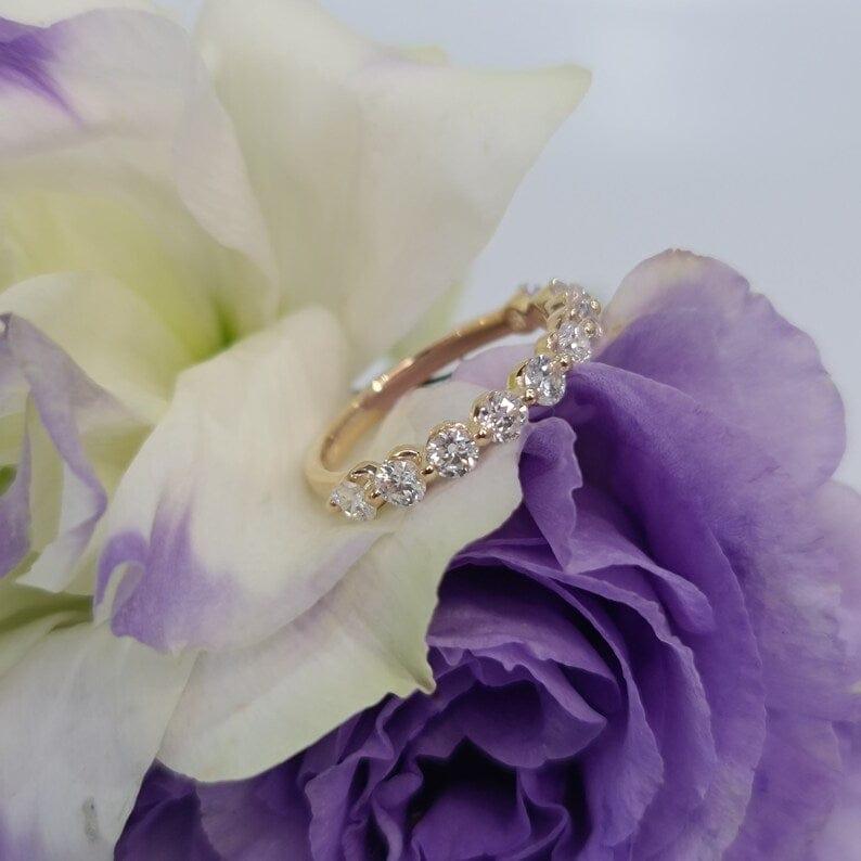 14k gold round lab grown diamond eternity band, front view showing fine craftsmanship